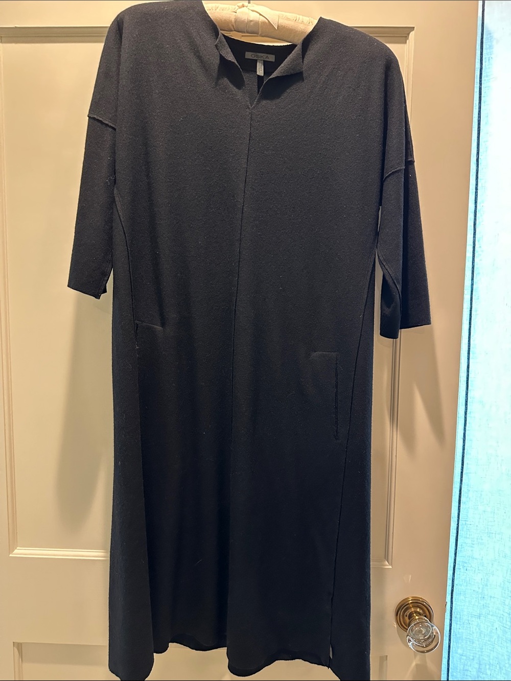 Minimalist Black Midi Dress with V-Notch Collar